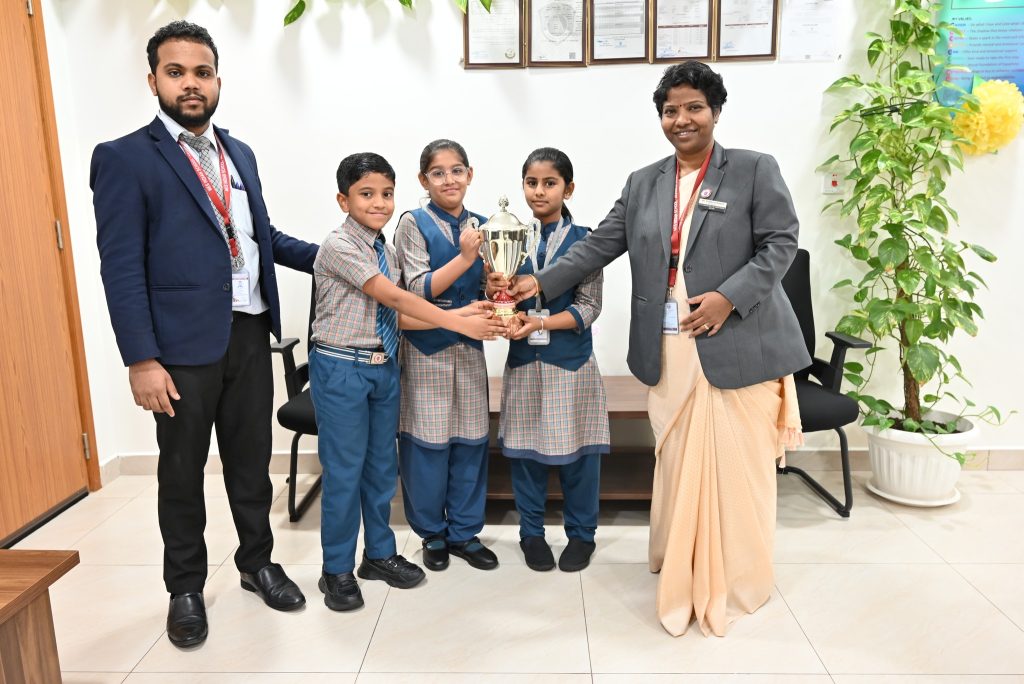 Awarded trophies to 4E, 5C and 9B respectively for being the cleanest classrooms in the school.